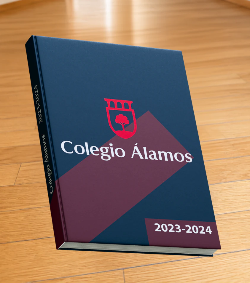 Anuario escolar Colegio Álamos 2023–2024 con portada azul y vino